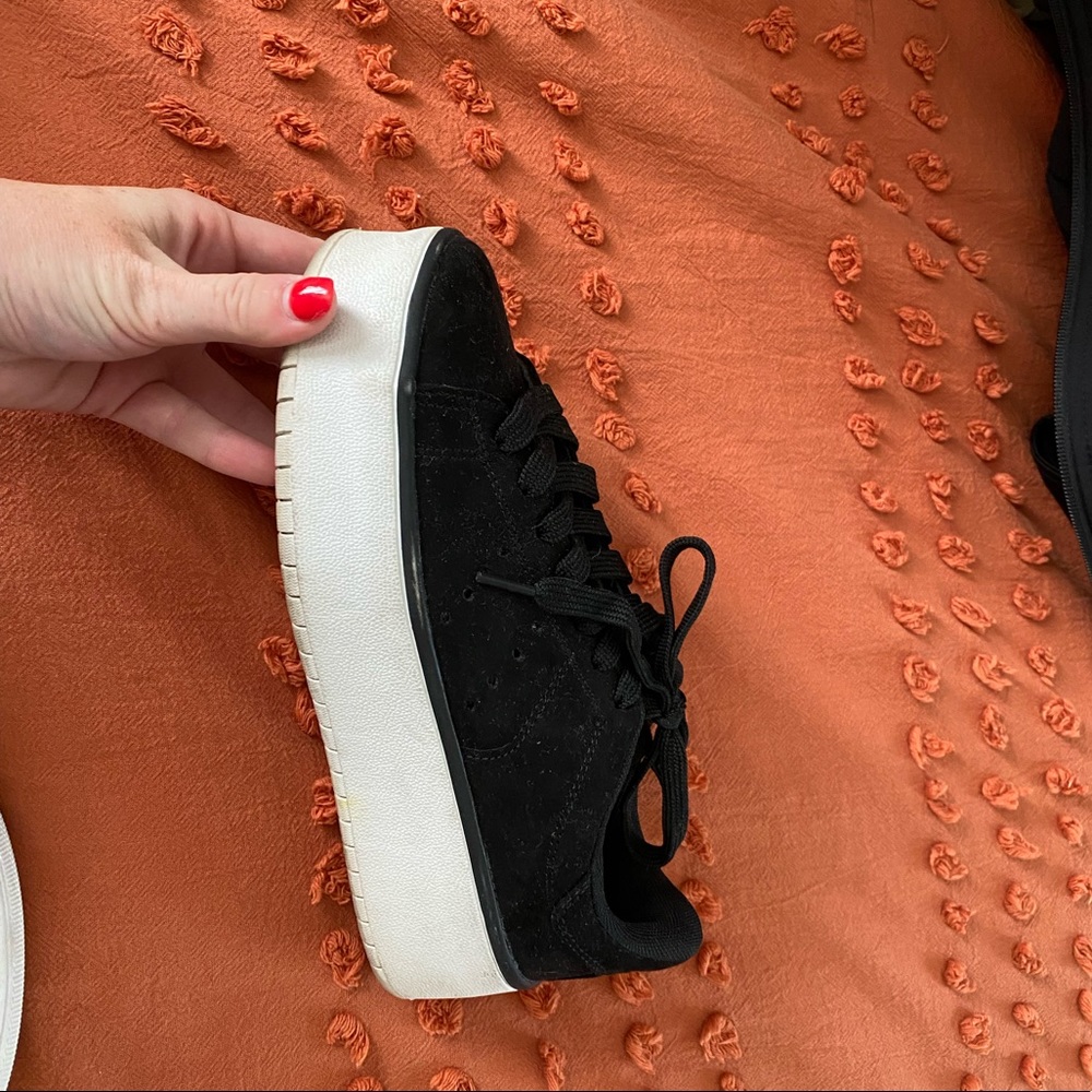 Black platform sneakers